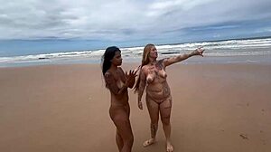 Couple enjoys beach time in front of friends