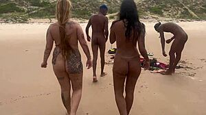 Couple enjoys beach time in front of friends