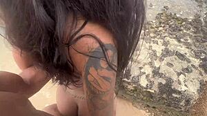 Couple enjoys beach time in front of friends