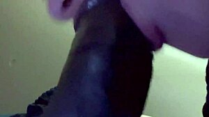 overwhelmed by worshipping his massive black cock deeply