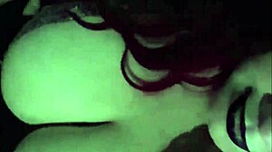 chubby goth girl with big natural tits watching hentai while playing with a big dildo