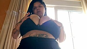 Provocative BBW Latina Flashes Huge Tits Smoking in Motel Window