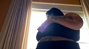 Provocative BBW Latina Flashes Huge Tits Smoking in Motel Window