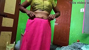 ammu's big natural tits spill out while changing saree