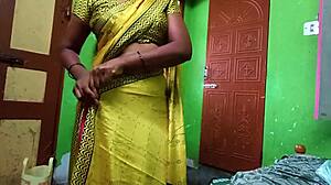 ammu's big natural tits spill out while changing saree