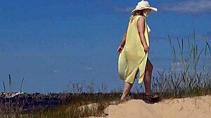 mommy shows off her curves on the beach