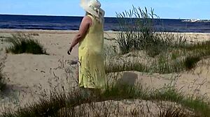 mommy shows off her curves on the beach