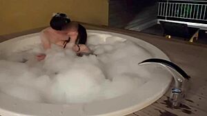 suggestive japanese couple gets intimate in onsen bath