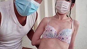  asian japanese woman performs striptease and pussy show