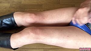 Im wearing a mini-skirt and boots with an anal vibrator inserted